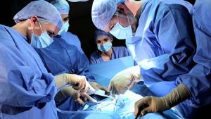 A Surgical Team Works Closely Together